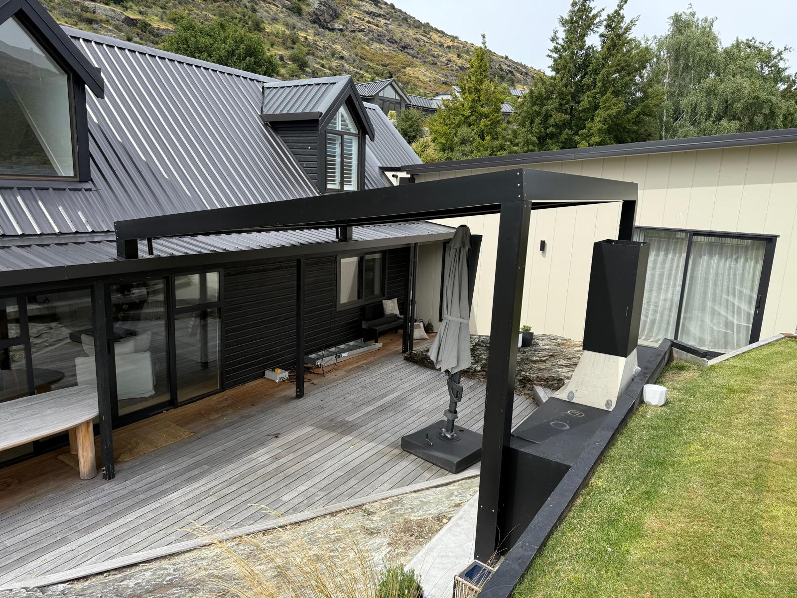 Louvre roof frame over a timber deck in Queenstown